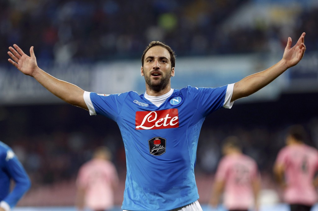 Napoli's Higuain celebrates after scoring against Palermo's during their Serie A soccer match at San Paolo stadium in Napoli